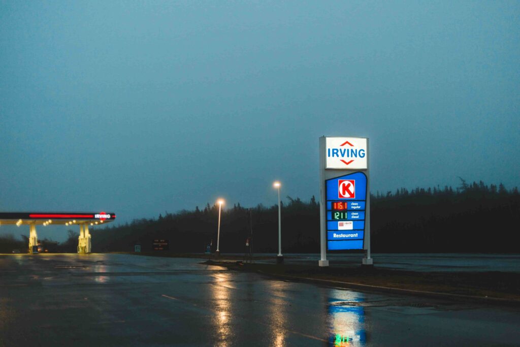 digital gas price sign at modern fuel station