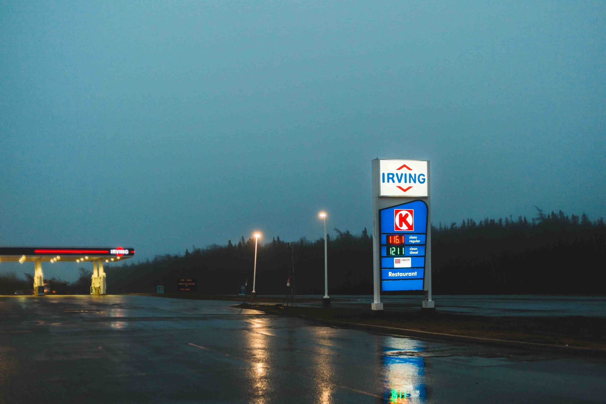 digital gas price sign at modern fuel station