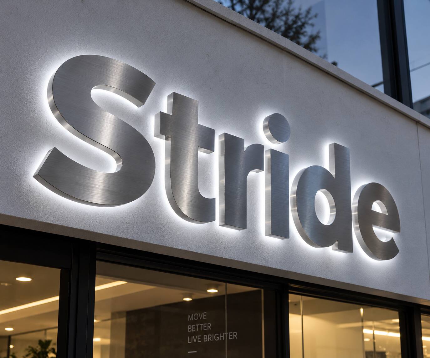 Stainless steel halo lit channel letters installed on a commercial storefront
