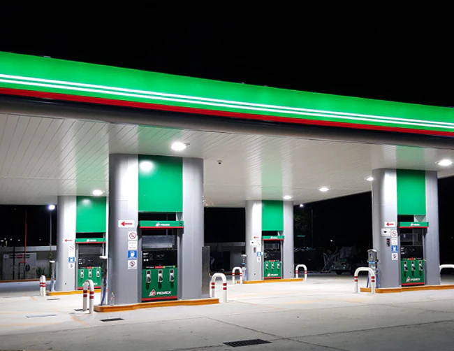 LED canopy lighting system for fuel station visibility