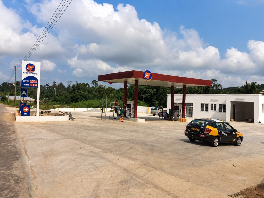 BF Petroleum gas station with custom canopy signage, pylon sign and LED fuel price display