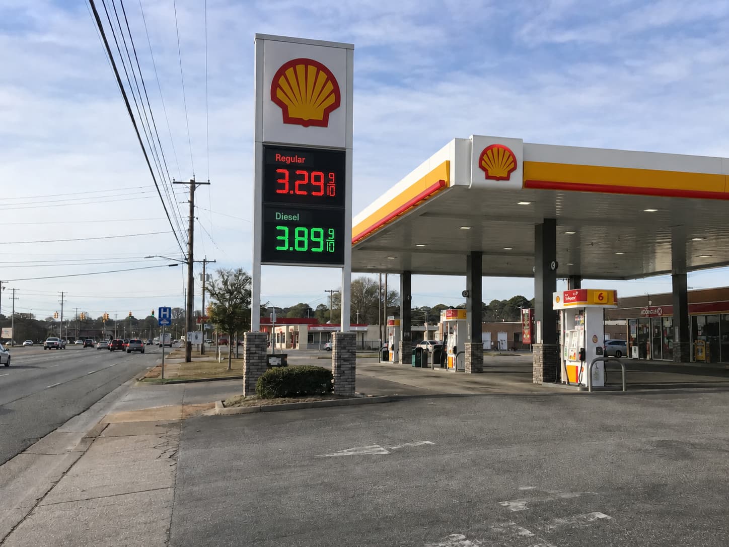 Custom LED gas price sign installed on a fuel station pylon