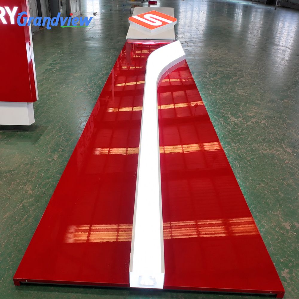 SURE canopy fascia and illuminated logo in factory production