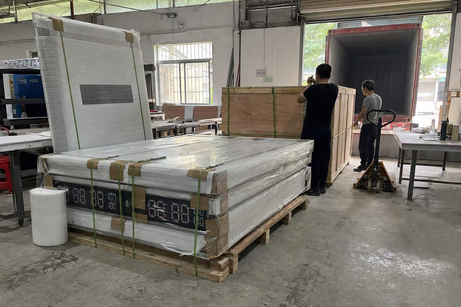 Custom signage products packed in wooden crates for overseas shipment